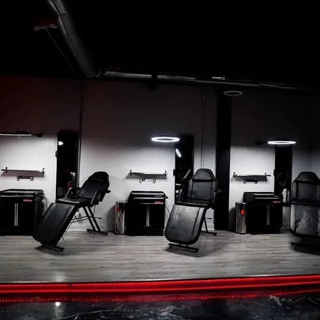 Empty tattoo stations on the ATLANTA INK studio floor